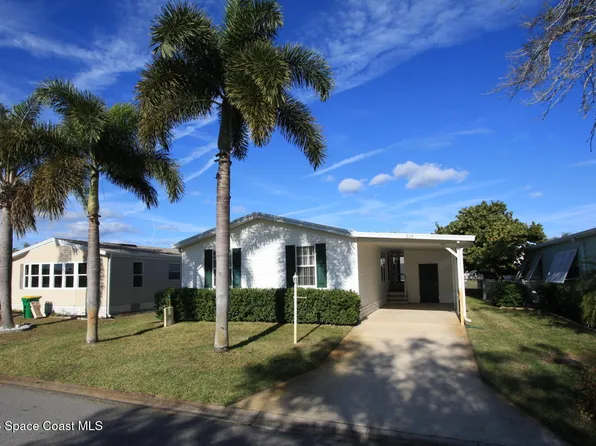 318 Macadamia Dr, Barefoot Bay, FL 32976