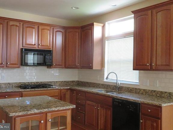 4th image of 9888 E Hill Dr