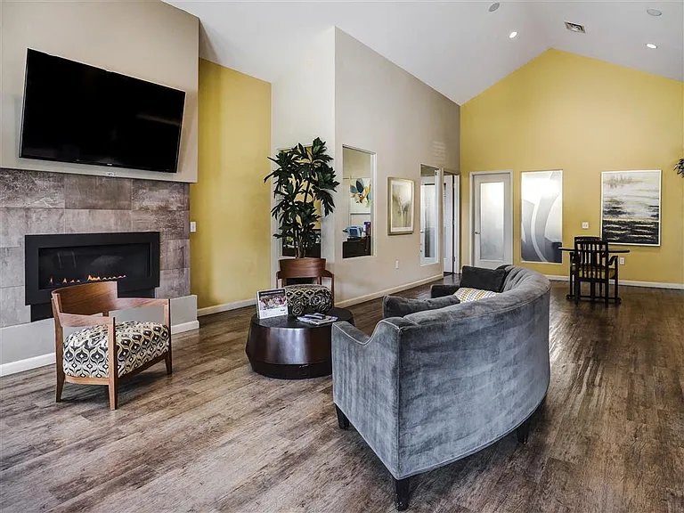 Common area for residents to relax around the fireplace