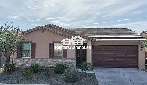 8825 W Albeniz Pl Photo 1