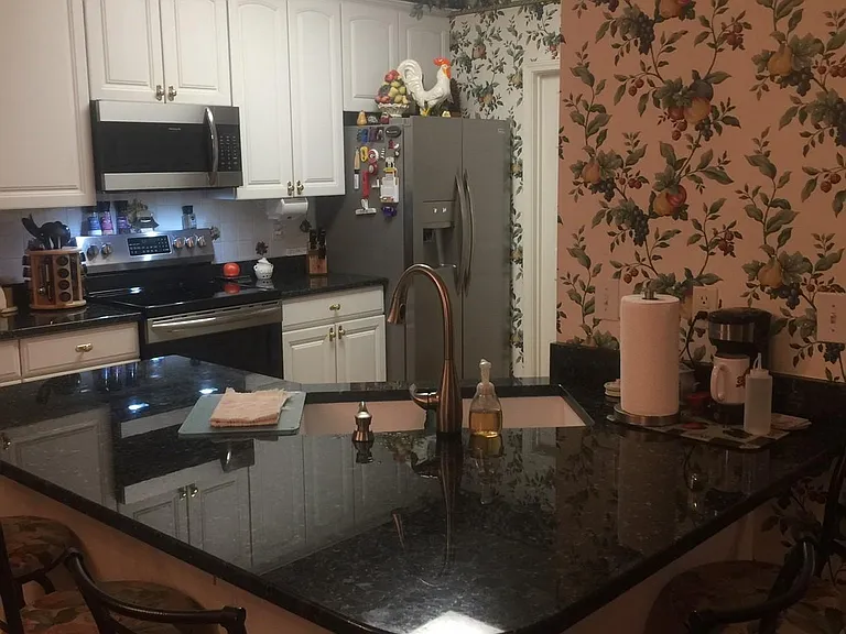 Kitchen featuring granite counter tops