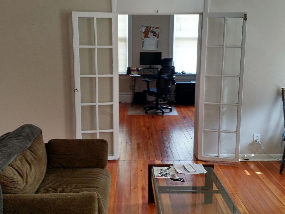 "Dining room off kitchen, looking through French doors to "L