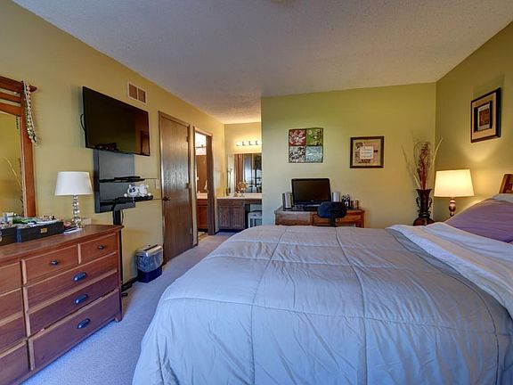 The Master Bedroom is very spacious. This view shows the vanity with sink.