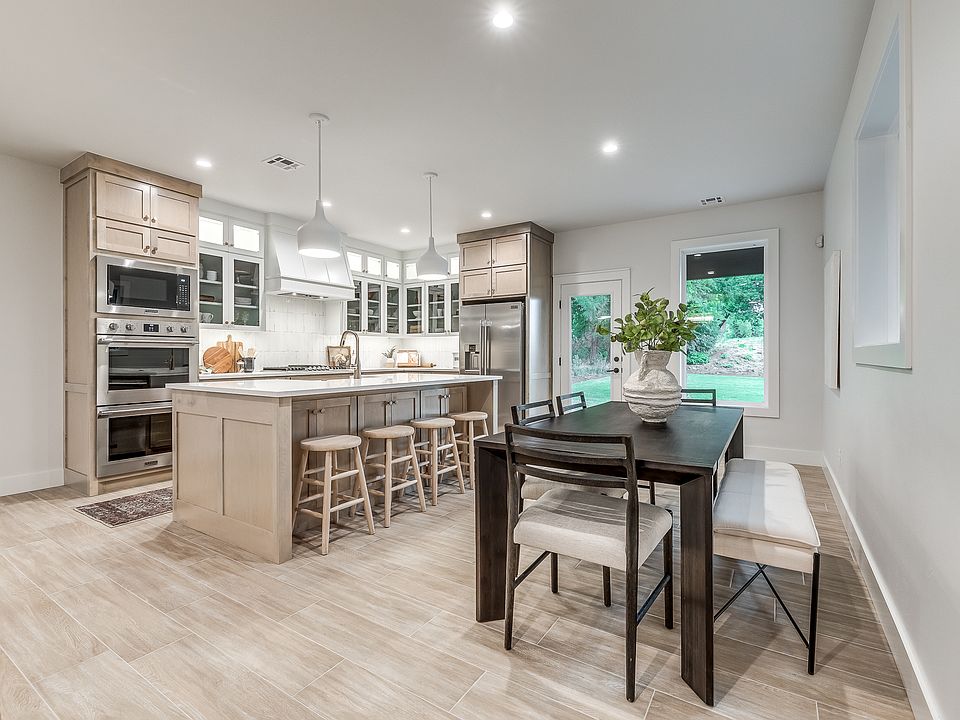 Enjoy Park Views from this 4-Bed Downtown Home _ stunning kitchen, airy layout, and access to John Rex Charter School in prime OKC location