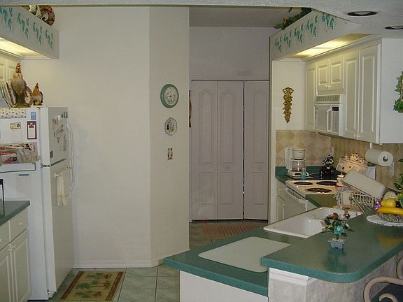 Open Kitchen with Corian counters