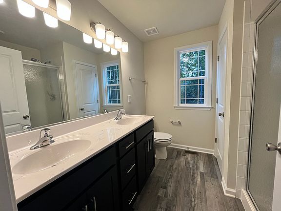 Master bathroom. Double vanity, with large linen closet and shower.