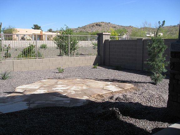 Xeriscape yard with flagstone patio and mountain views