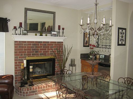 Dining with fireplace and Granite Wet Bar