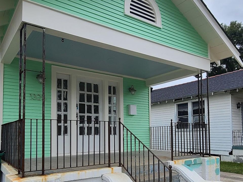 Front Porch Note: Raining, porch, and steps will be painted. Landscaping will be installed.