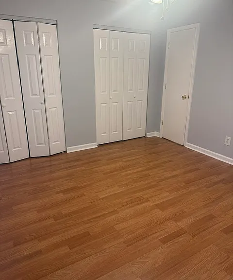 Primary bedroom dual closet system