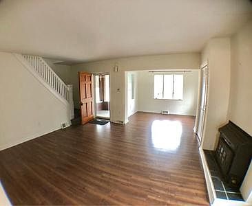 Living room and Sun room/office/den.