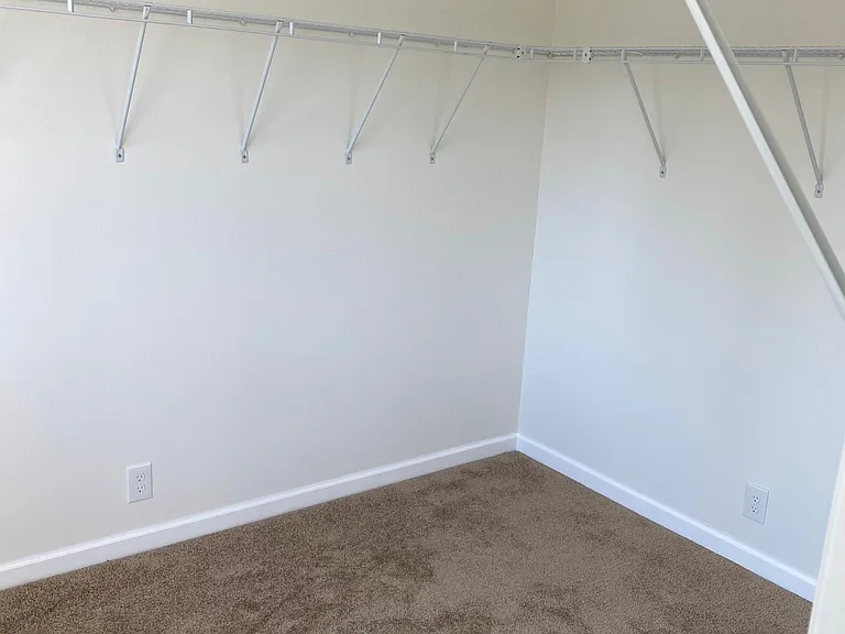 Master walk in closet. Lots of space and has window with blinds as well.