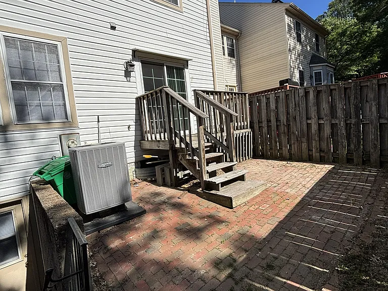 Brick patio with balcony