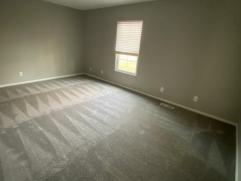 Master bedroom with walk in closet