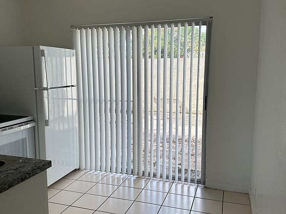 Sliding glass door going to private patio