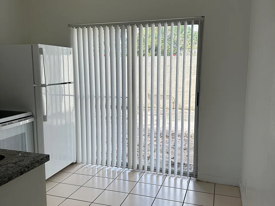 Sliding glass door going to private patio