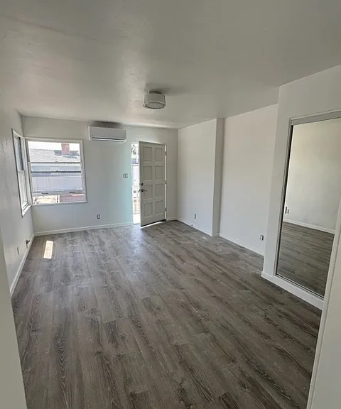 Looking at main room of unit from kitchen
