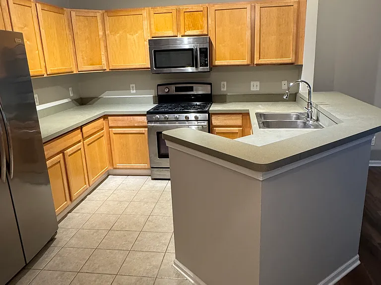 Kitchen with gas range/oven, microwave, dishwasher