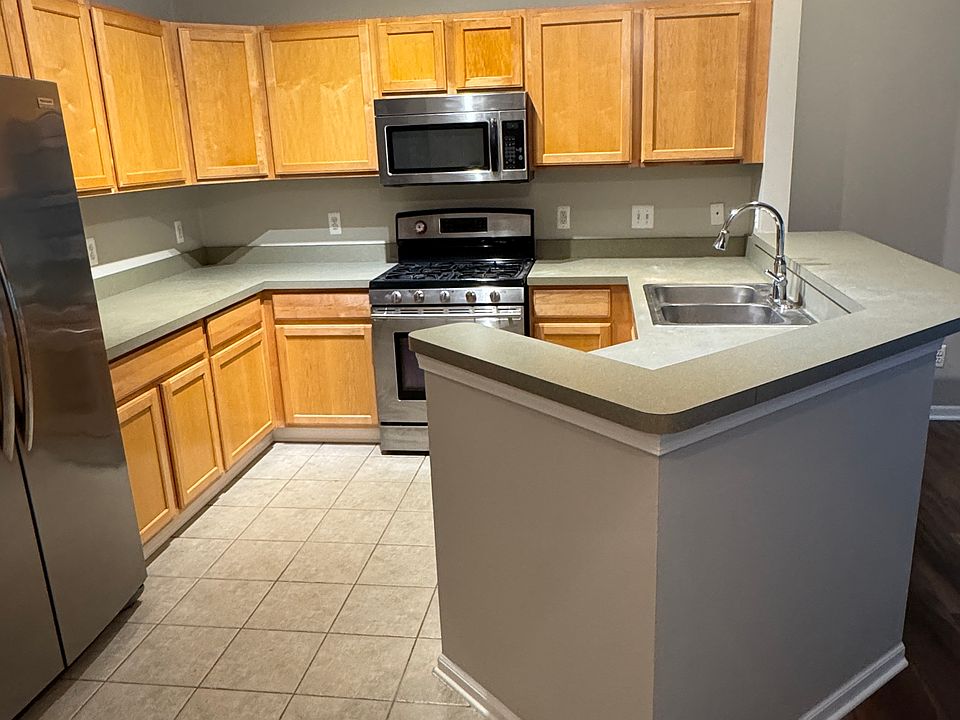 Kitchen with gas range/oven, microwave, dishwasher