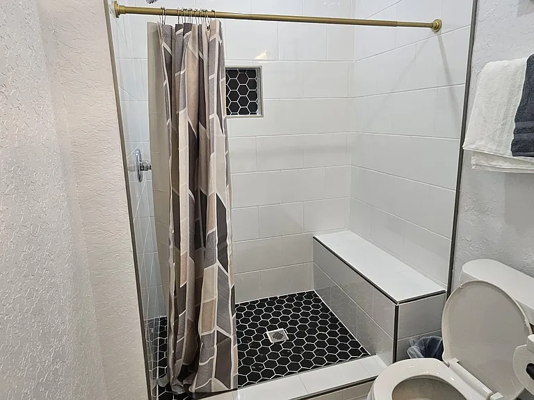 Tiled bathroom 2 shower with curtain rod