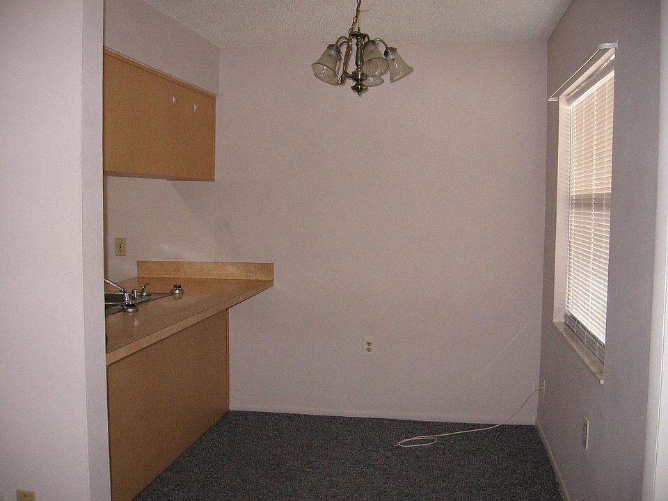 dining room by counter bar or for table. Area: 8 ft W x 7 ft L.