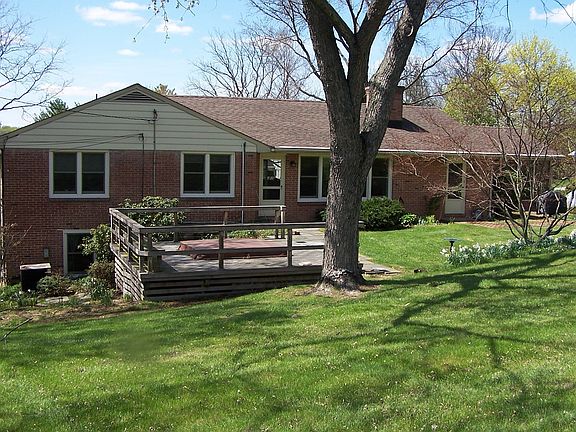 Backyard with hot tub.
