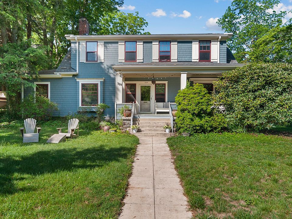 Large front yard set back from the street.