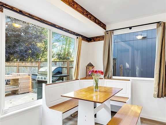 Updated dining area now has LVP flooring (waterproof flooring is ideal here in the NW and it is much more durable than laminate materials).