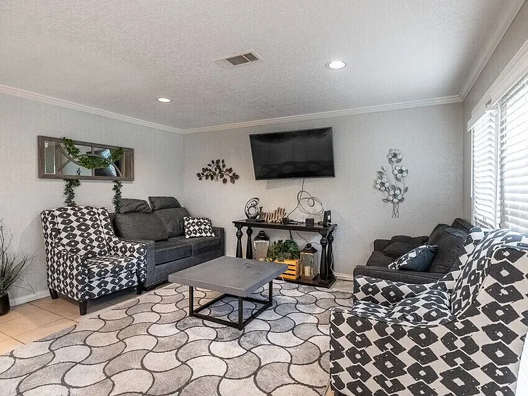 Elegant common area with stylish furniture and modern decor for residents to gather and relax.