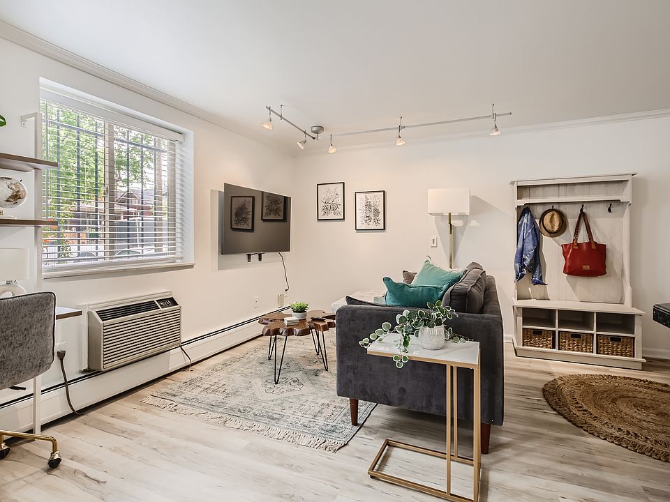 The bright and airy living room features all new, stylish furnishings and a large 55" smart TV with Roku for streaming your favorite movies and shows. There is also a dedicated workspace for your work from home needs!