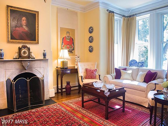 Living Room fireplace and detailed moldings