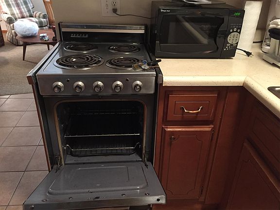 Apt size stove, microwave and coffee maker