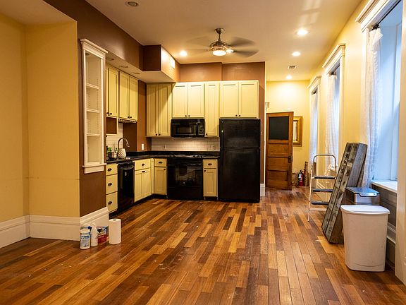 First floor viewing the kitchen from the living area.