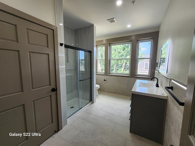 Luxurious and Large Tiled Bathroom