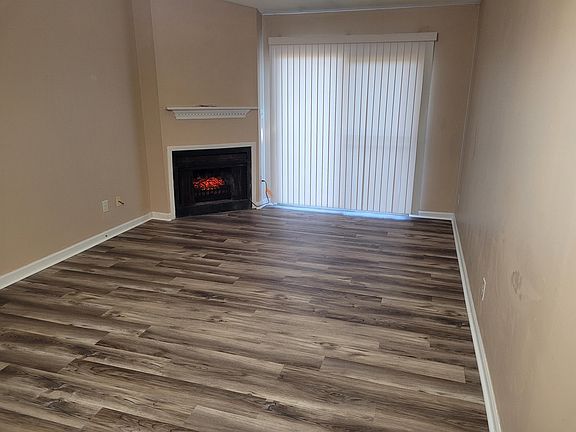 Living room w/ Electric logs