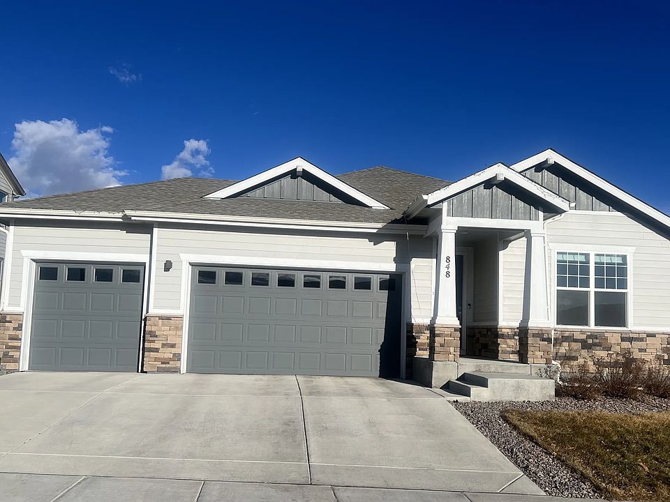 Front House with 3 car garage port