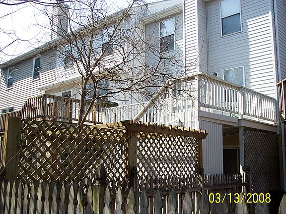 Backyard with deck and 2 patio