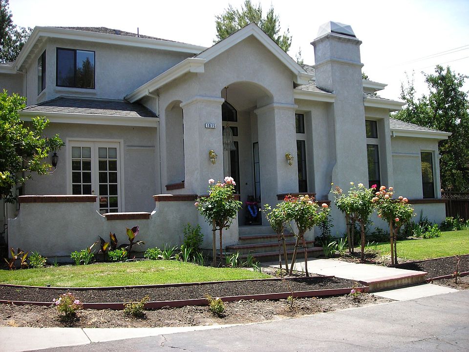 Front with formal landscaping