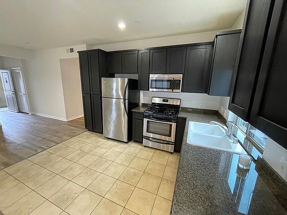 Appliances included. Freshly re stained and sealed cabinetry.