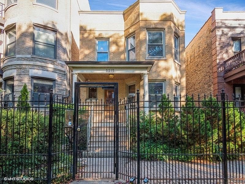Front exterior with gated entry