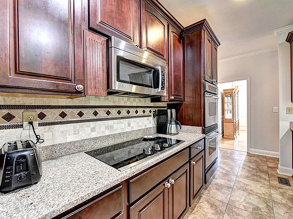 Travertine backsplash.