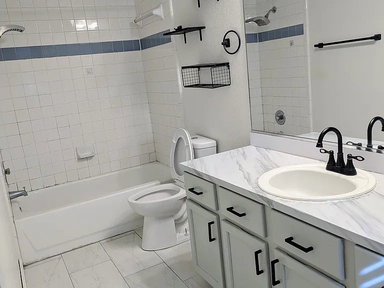 Private master bathroom new tile and toilet