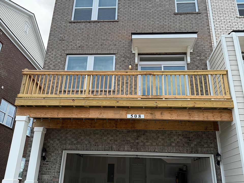 Back of the house with 2 Car Garage