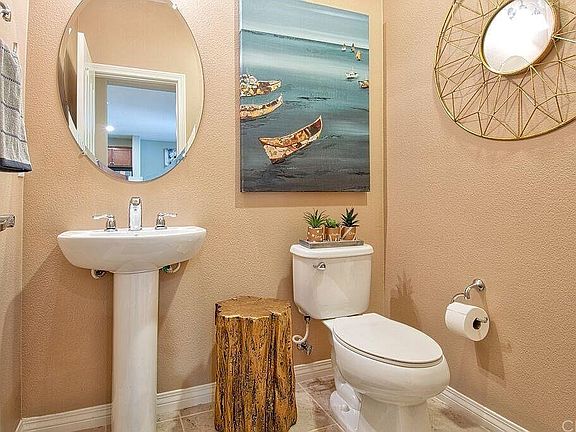 Downstairs half bath, large and clean.