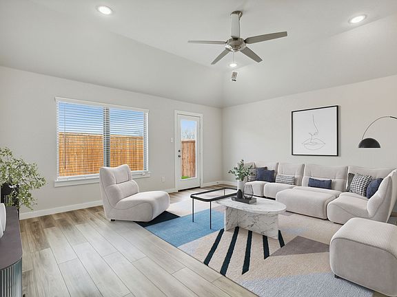 Living Room in the Jade II home plan by Trophy Signature Homes - REPRESENTATIVE PHOTO