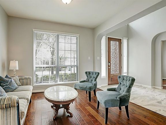 Formal living room greets you as you walk in.