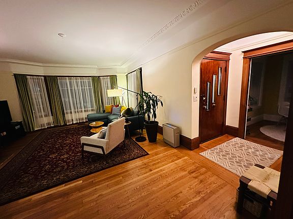 Entryway and slice of the spacious living room