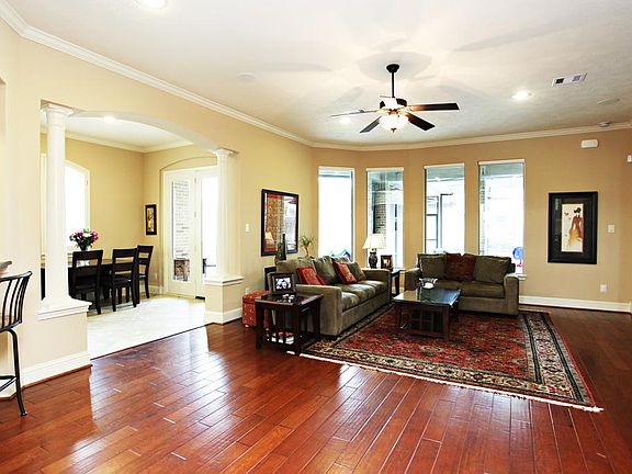 View of Living Room, Breakfast Room and Outdoor Patio.