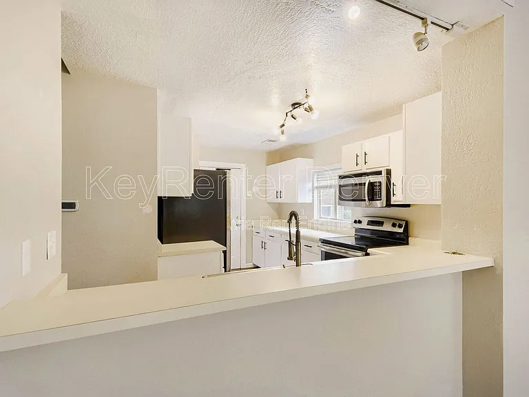 1099 S Walden Way #101 — Photo 7