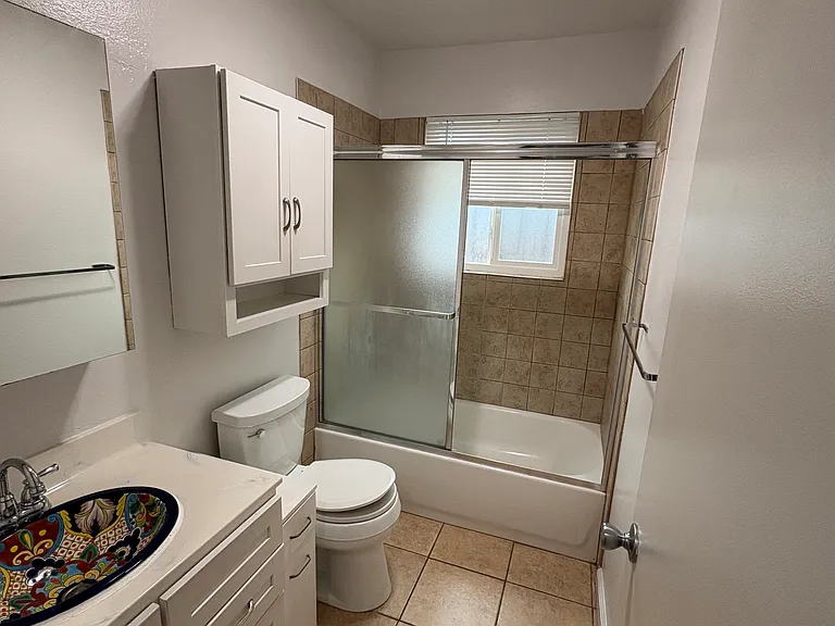 Bathroom with custom made tile sink